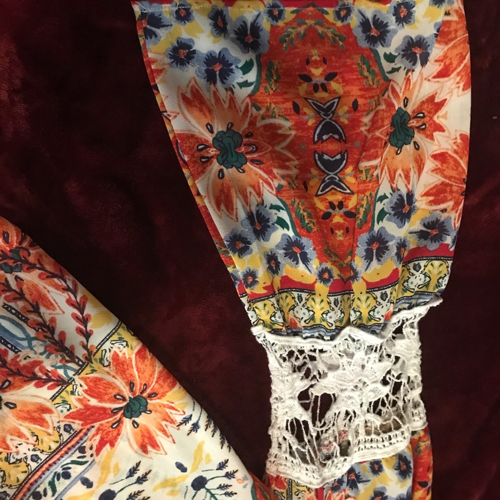 Colorful floral top with bell sleeves. - Picture 3 of 4
